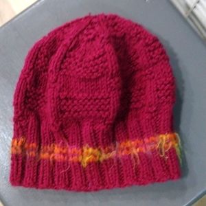 Maroon Knitted beanie with multicolor mohair like accent. Size sm/md